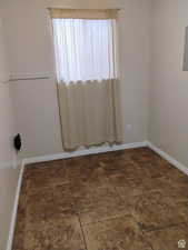 Unfurnished room with electric panel