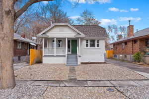 Bungalow-style home with a porch