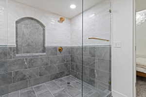 Bathroom with tiled shower