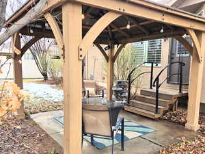 View of patio with a gazebo