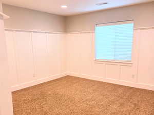 View of carpeted spare room