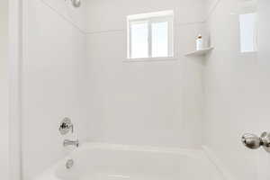 Bathroom featuring shower / bathtub combination