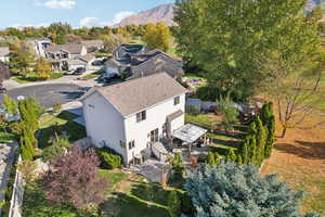 Birds eye view of property with a mountain view