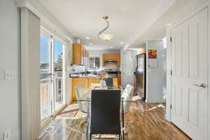 Dining room with hardwood / wood-style floors