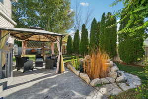 View of patio / terrace with an outdoor living space and a gazebo