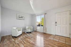 Living area featuring light hardwood / wood-style flooring