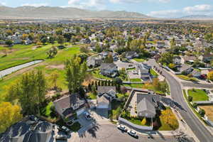 Birds eye view of property with a mountain view