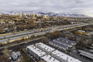 Birds eye view of property with a mountain view