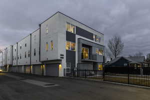 View of front of property featuring a garage