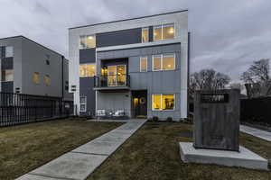 View of front of property featuring a front yard