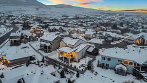 Snowy aerial view with a mountain view