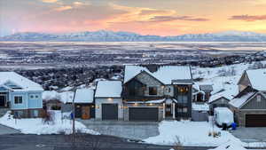 Snowy aerial view with a mountain view