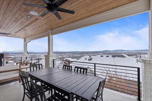 Snow covered patio with ceiling fan