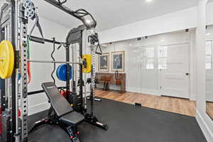 Workout area featuring a textured ceiling