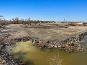 Drone / aerial view featuring a water view and a rural view