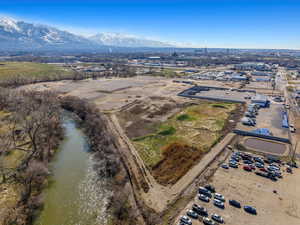 Aerial view featuring a water and mountain view