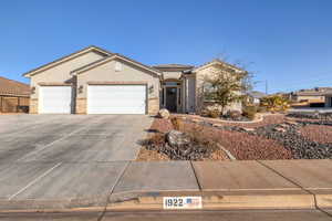 Ranch-style home with a garage