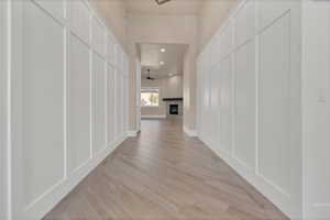 Hallway featuring light hardwood / wood-style flooring