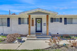 View of front of home with brick siding