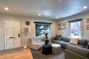 Living room with hardwood / wood-style floors