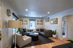 Living room featuring hardwood / wood-style floors and plenty of natural light