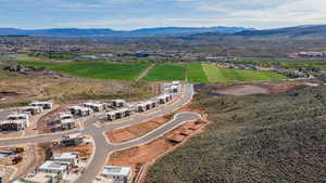 Birds eye view of property with a mountain view