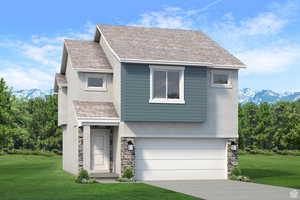 View of front of property with a garage, a mountain view, and a front lawn