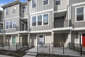 Townhome / multi-family property featuring board and batten siding