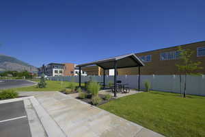 View of patio / terrace with a mountain view and fence
