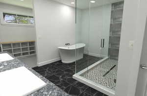 Bathroom with separate shower and tub and vanity