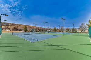 View of sport court with a mountain view