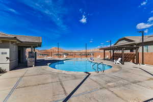 View of pool with a mountain view, a patio, and a pergola