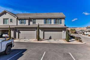 View of front of property featuring a garage