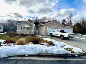 View of front facade with a garage