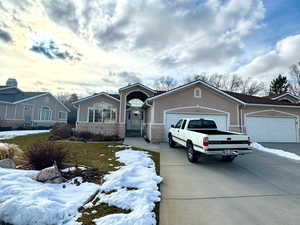 Ranch-style home with a garage