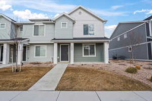 View of front of house with a front lawn