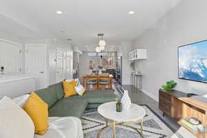 Living room with hardwood / wood-style floors