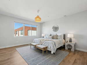 Bedroom featuring light wood-type flooring