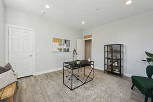 Office space featuring light hardwood / wood-style flooring