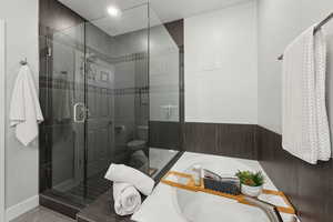 Ensuite bathroom with separate shower and tub