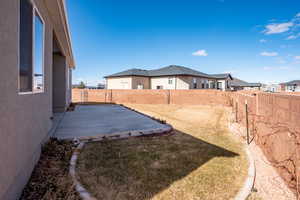 View of yard with a patio