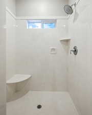 Bathroom with tiled shower
