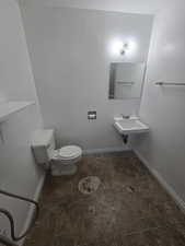 Unit 1 Bathroom with sink and toilet