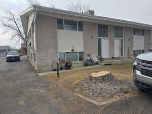 View of front of property featuring central AC unit