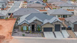 View of front facade featuring a garage