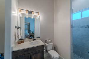 Bathroom with toilet and vanity