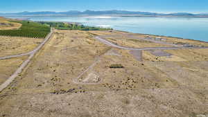 Drone / aerial view featuring a rural view and a water and mountain view