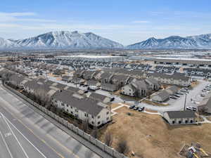 Birds eye view of property with a mountain view