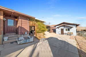 Exterior space with a patio and a storage shed