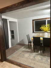 Dining area with a textured ceiling